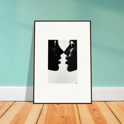 Framed black and white art print of two silhouettes for Eclipsing Soulcare Kisses