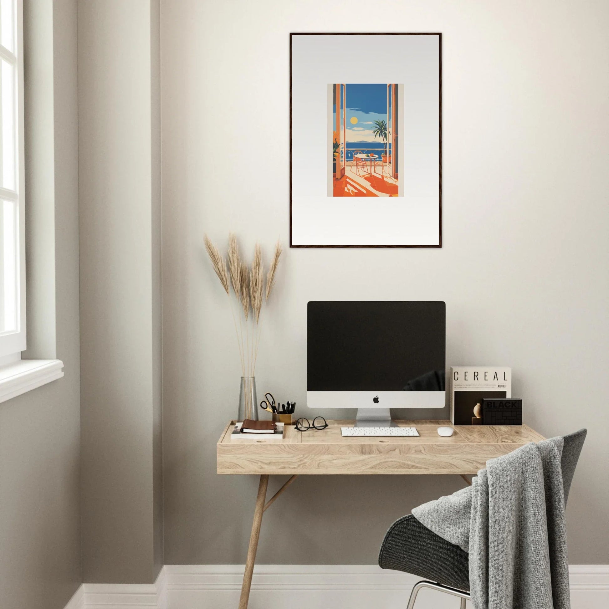 Minimalist wooden desk featuring an iMac and Special Edition Art™ above for Tranquil Mirage Brunch