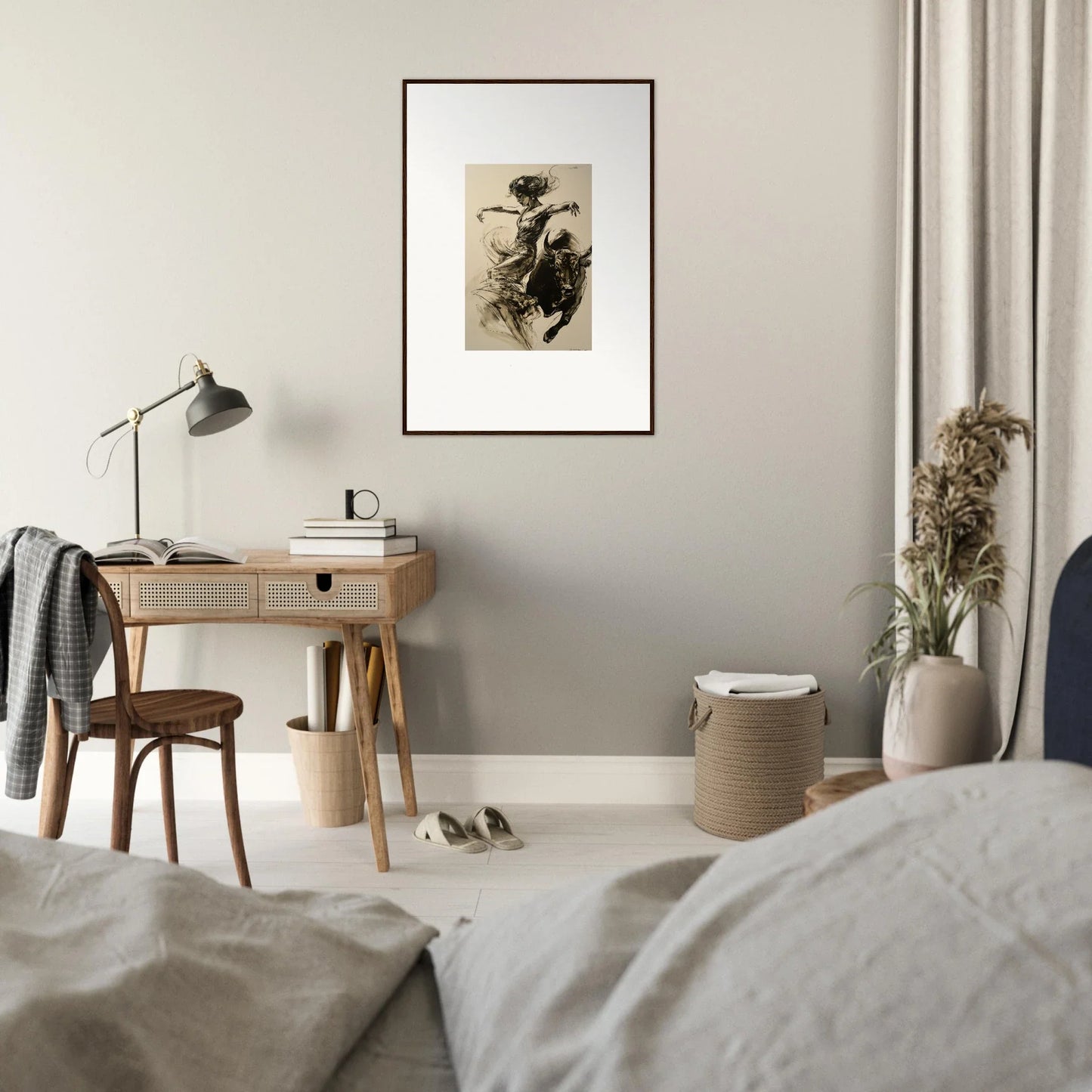 Minimalist wooden desk with Resilient Dancer Flame art and stylish lamp above it