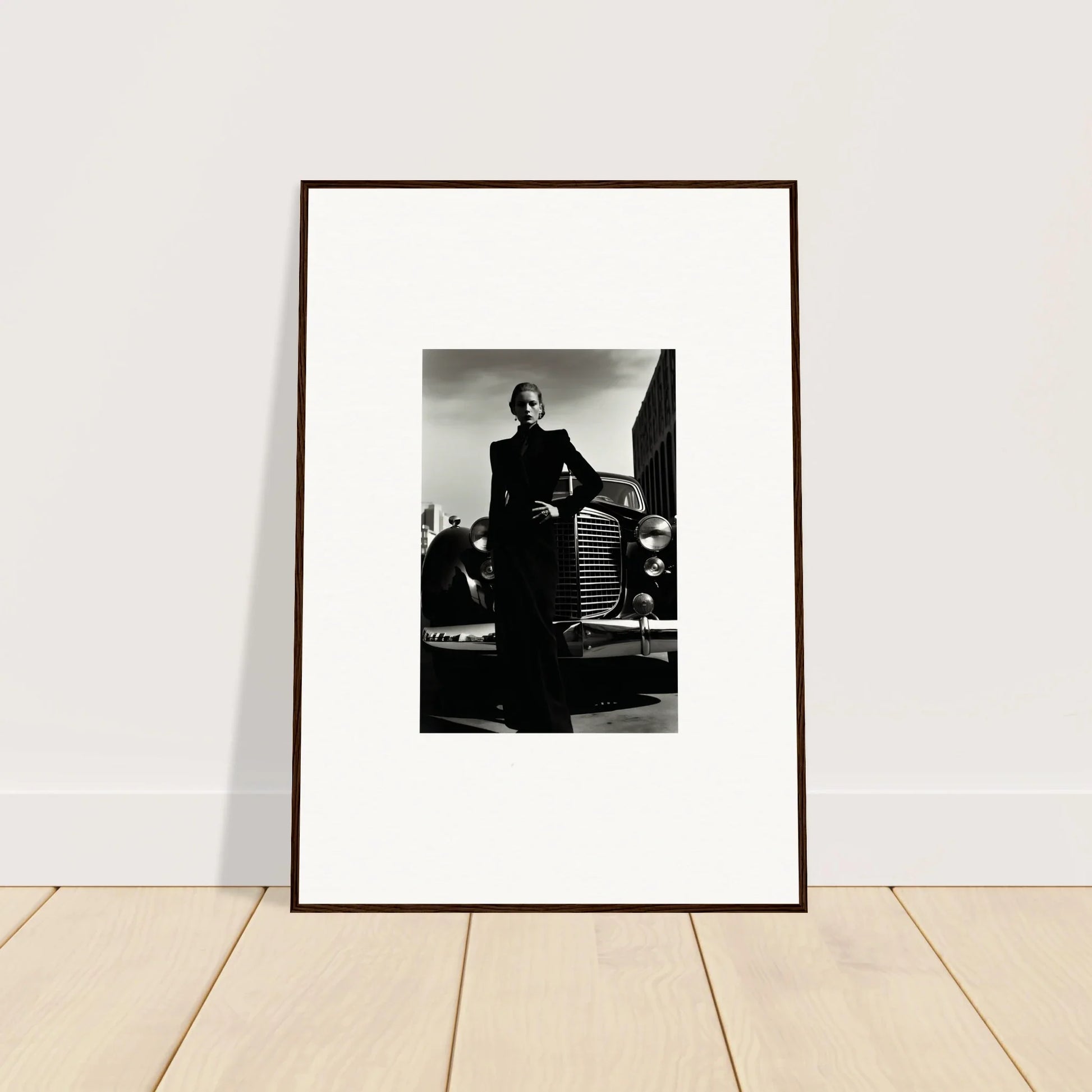 Framed black and white photo of a person with a vintage car from Noiray Vogue Explosion