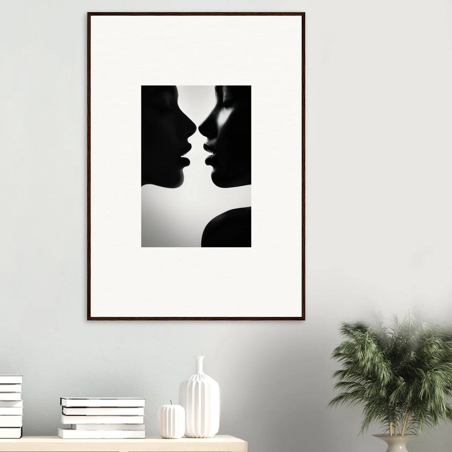 Black and white silhouette of two profiles about to kiss in Sables Dance premium framed wall art