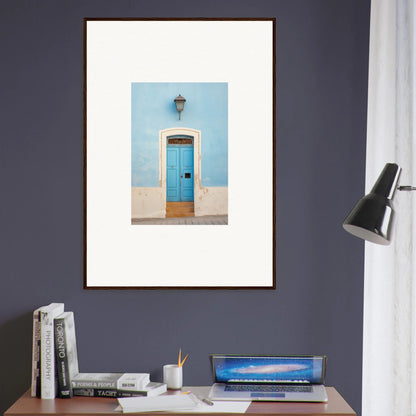 Framed wall art of a bright blue door on a light blue wall, Surreal Azure Vesaurrezz