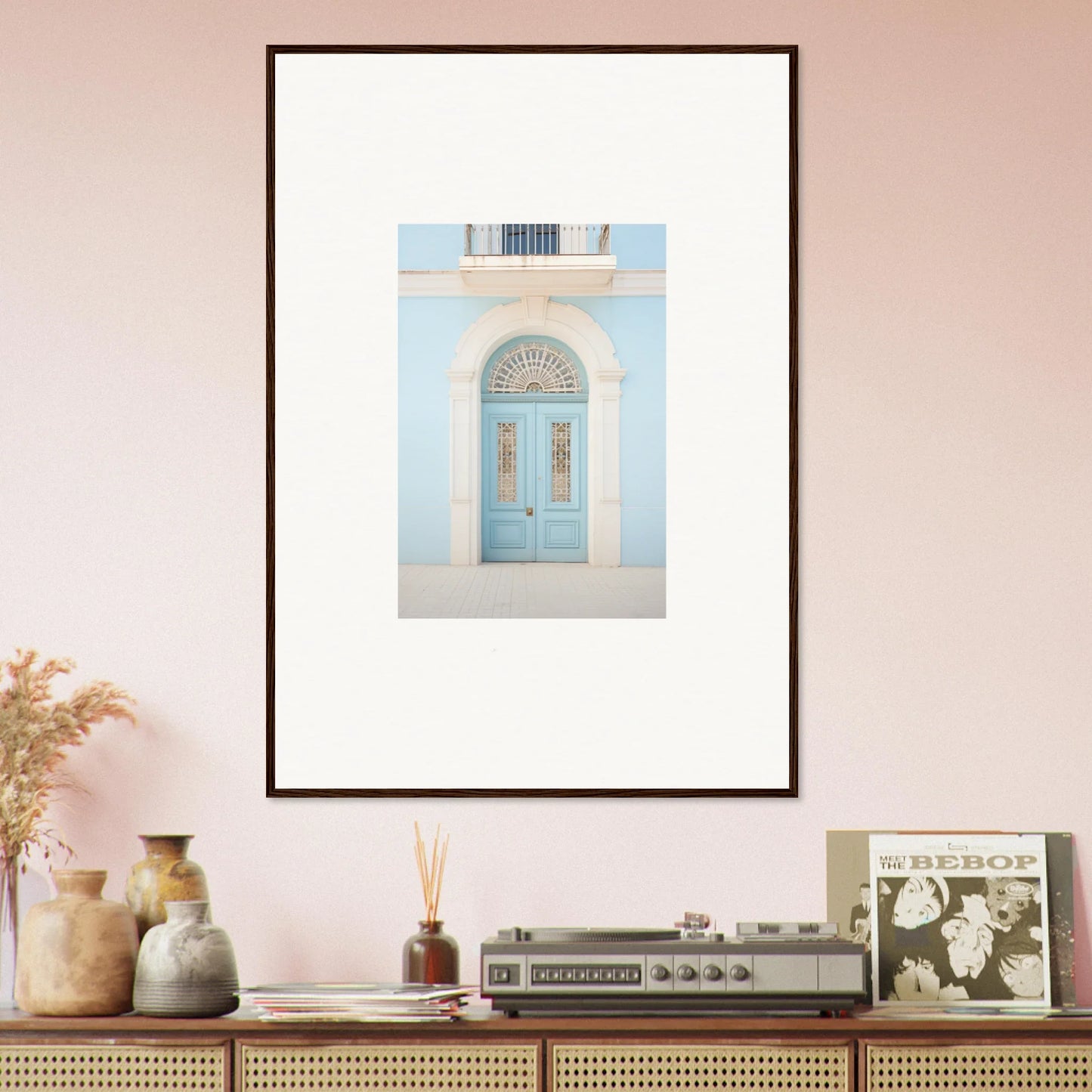 Framed wall art of a pale blue vintage door in Delphinium Dream Portal design