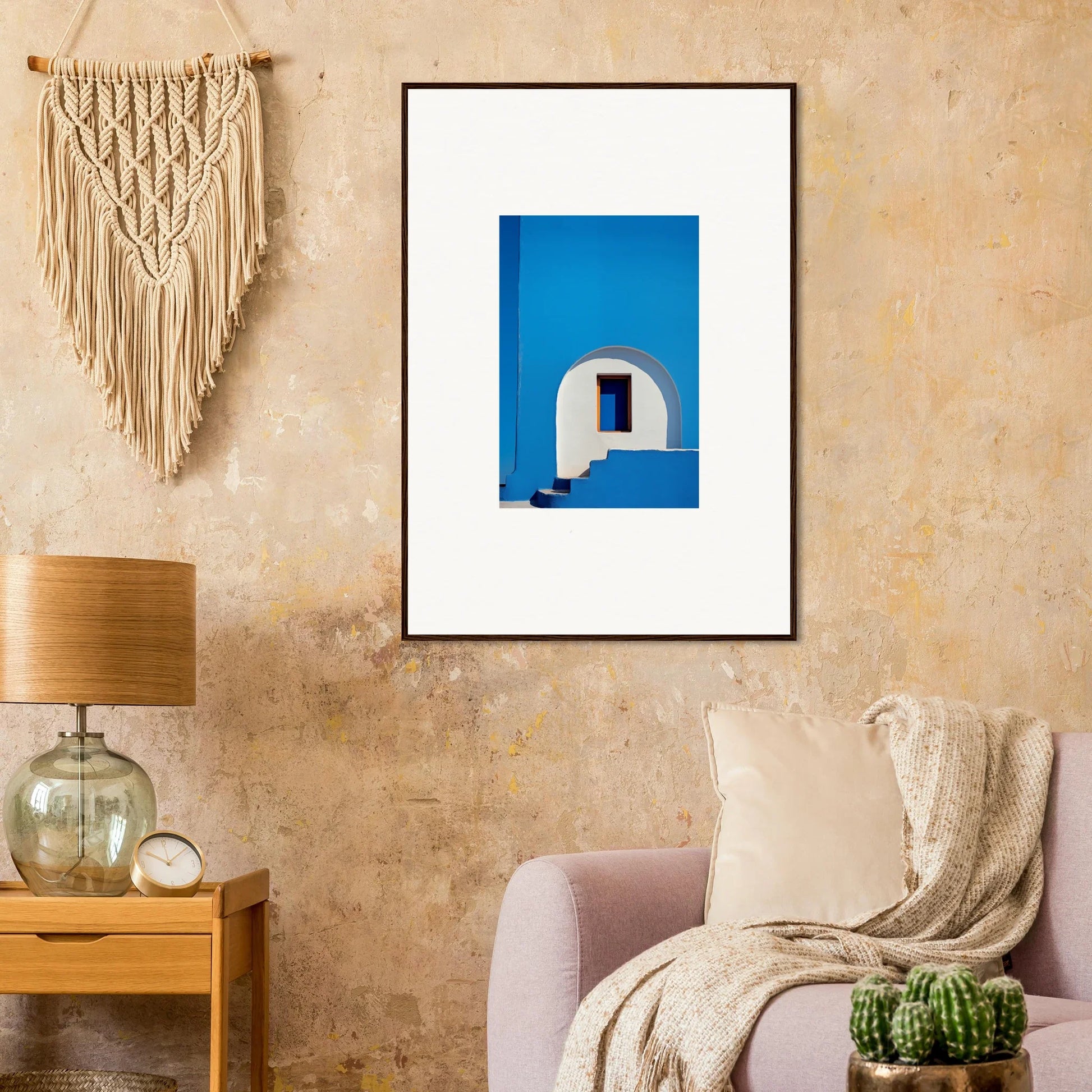 Framed wall art of a dreamy white Mediterranean building under a blue sky