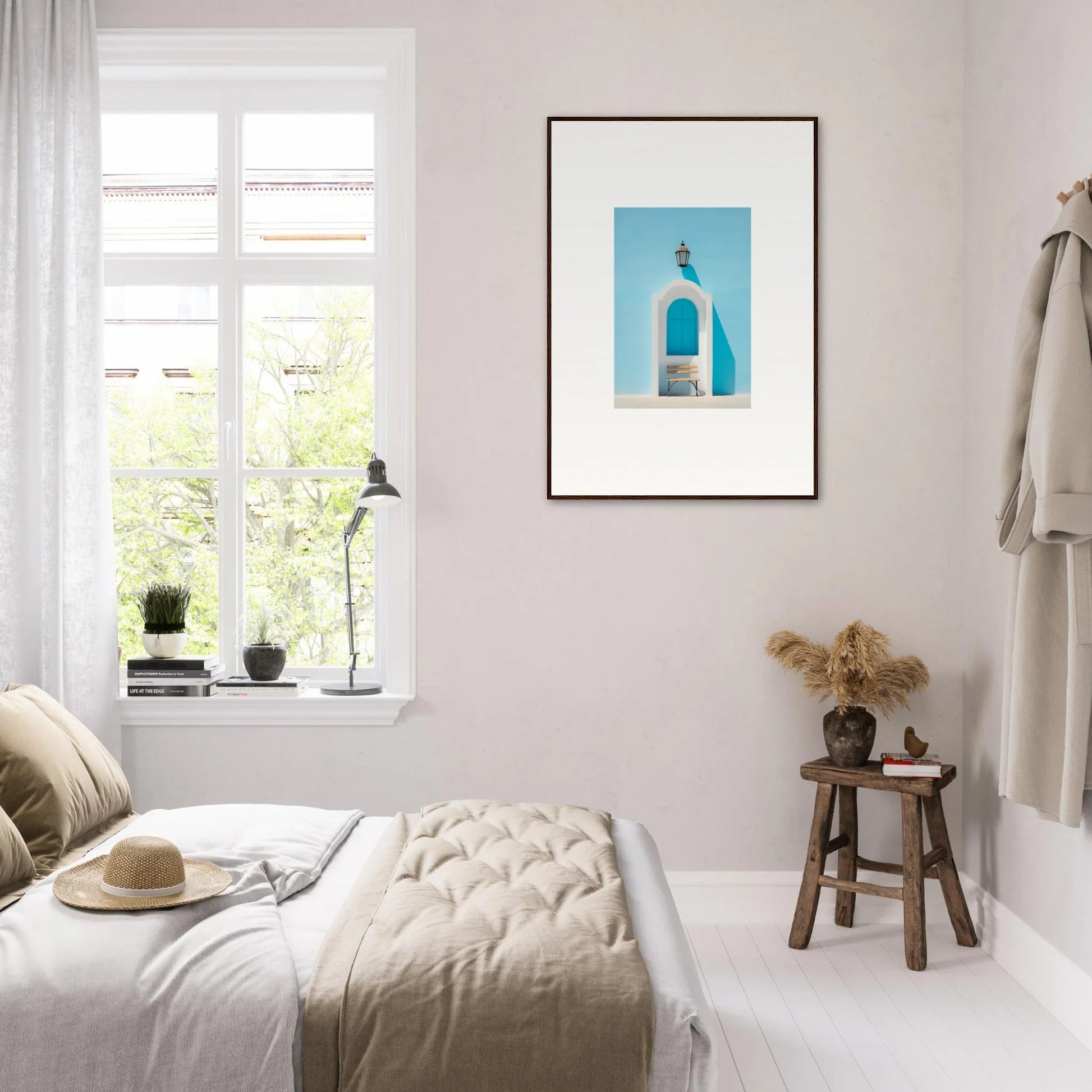 Bright minimalist bedroom featuring Ethereal Mediterranean Pause framed wall art