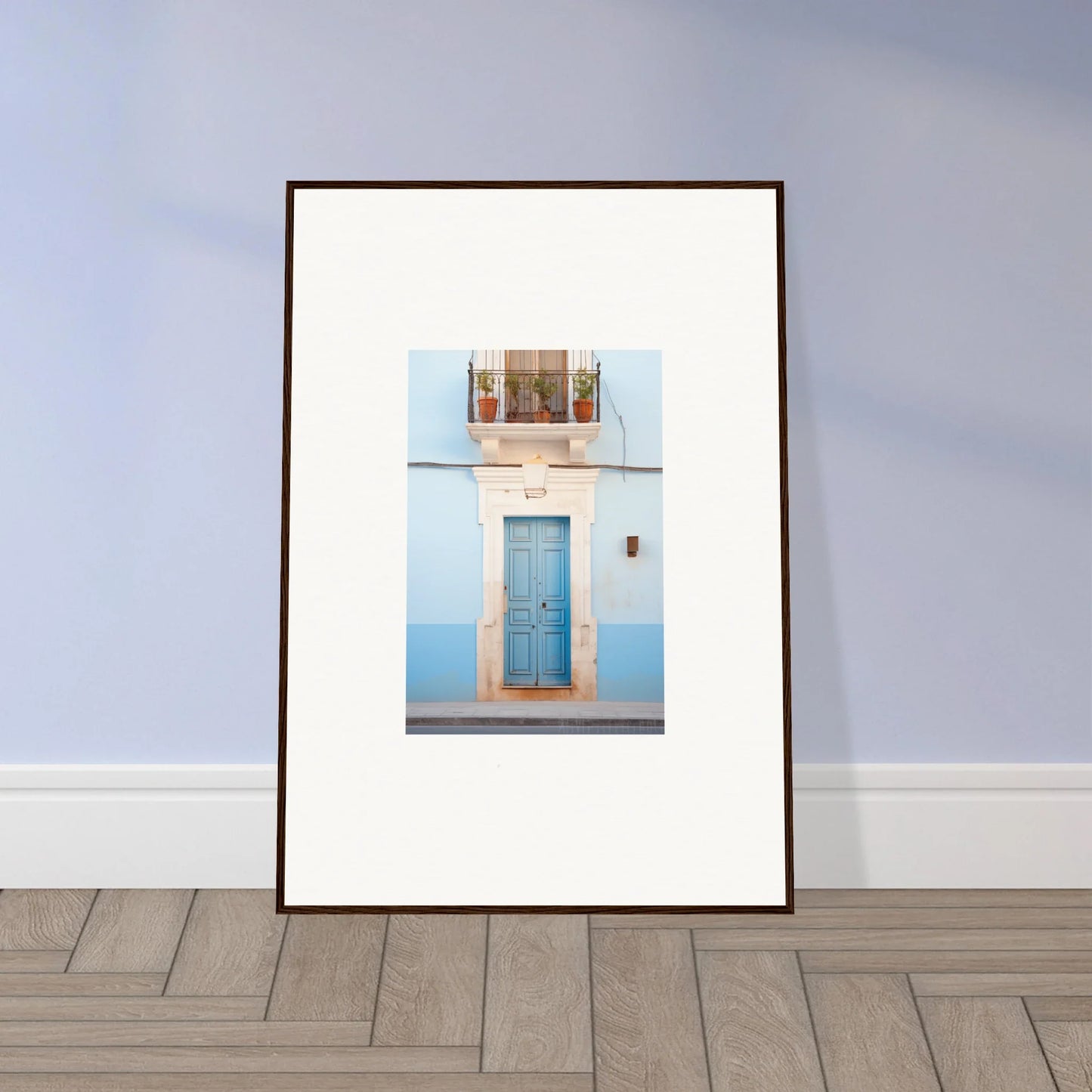 Framed wall art of an Ethereal Azul Entrance with a blue door and decorative window