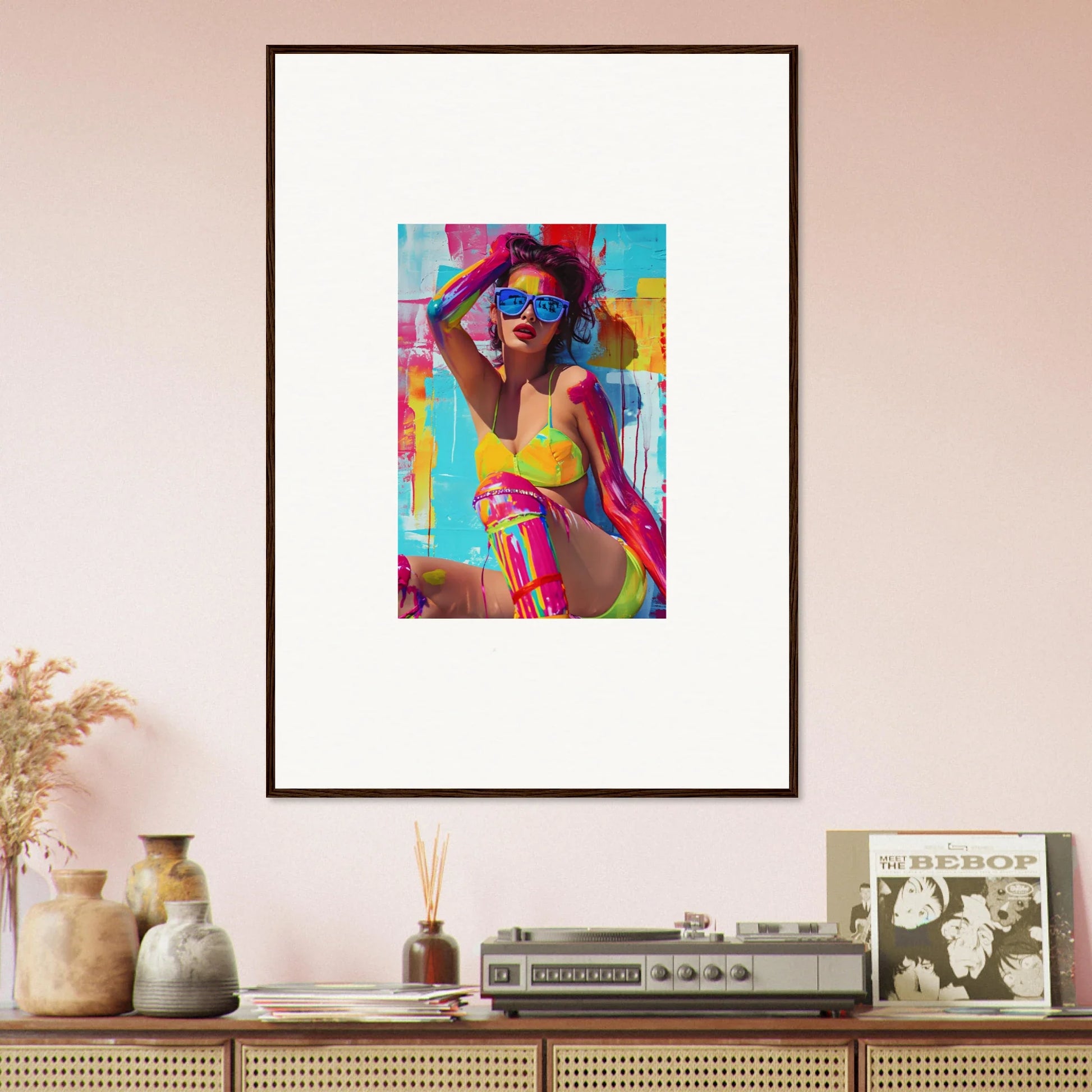 Framed canvas print of a woman in vibrant swimwear, perfect for room decoration