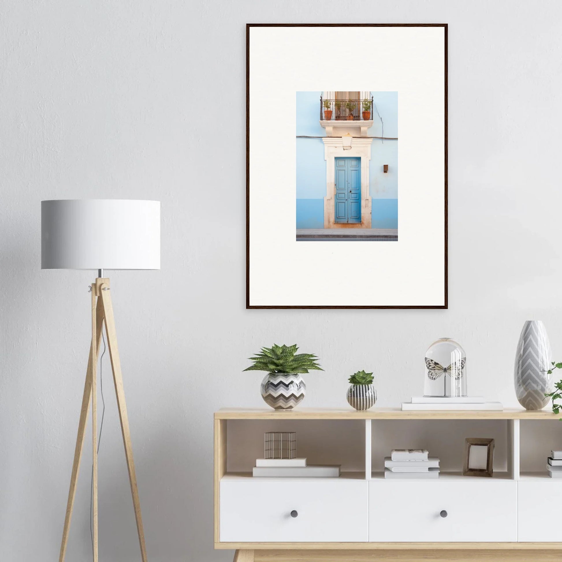 Framed wall art of an Ethereal Azul Entrance featuring a blue door and white wall