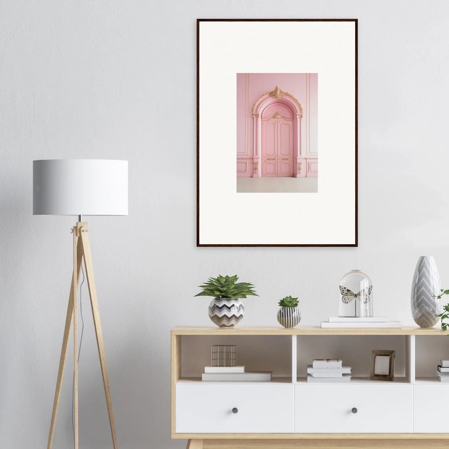 Framed wall art of a pink arched doorway in the Paris Dreams Frame style