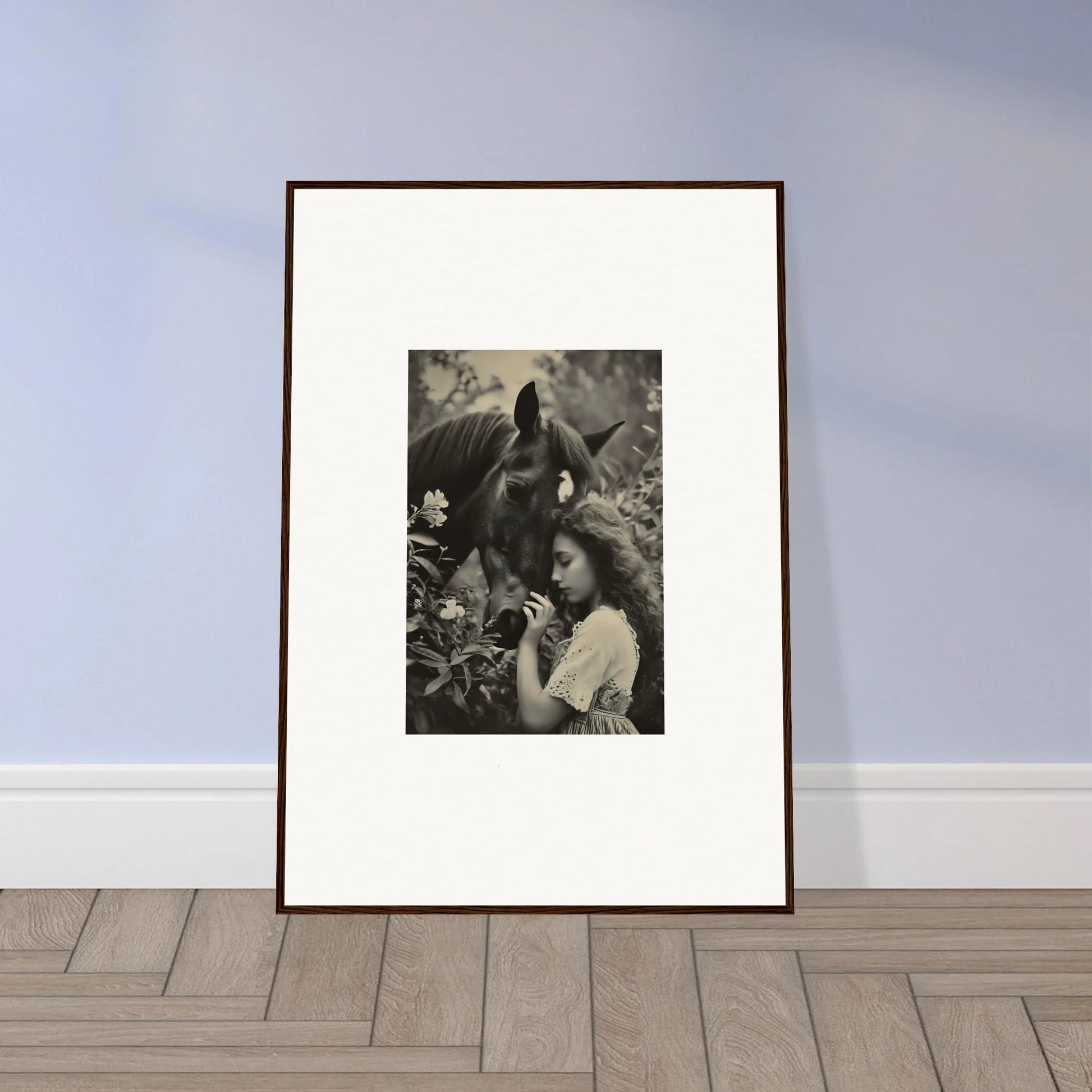 Framed black and white canvas print of a person with long hair holding a bird for room decoration