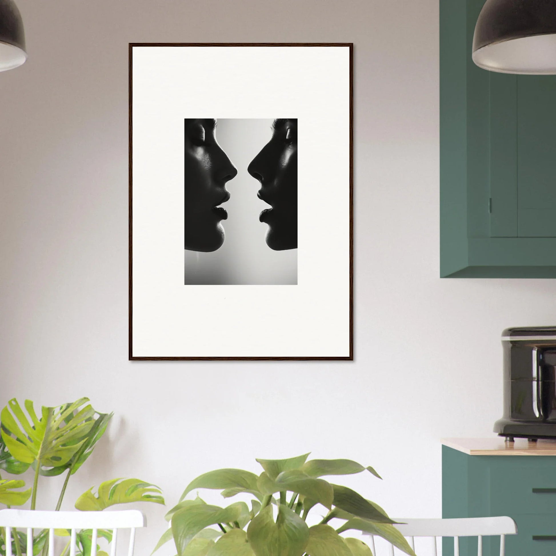 Black and white framed wall art titled Echo’s Embrace featuring two silhouetted profiles