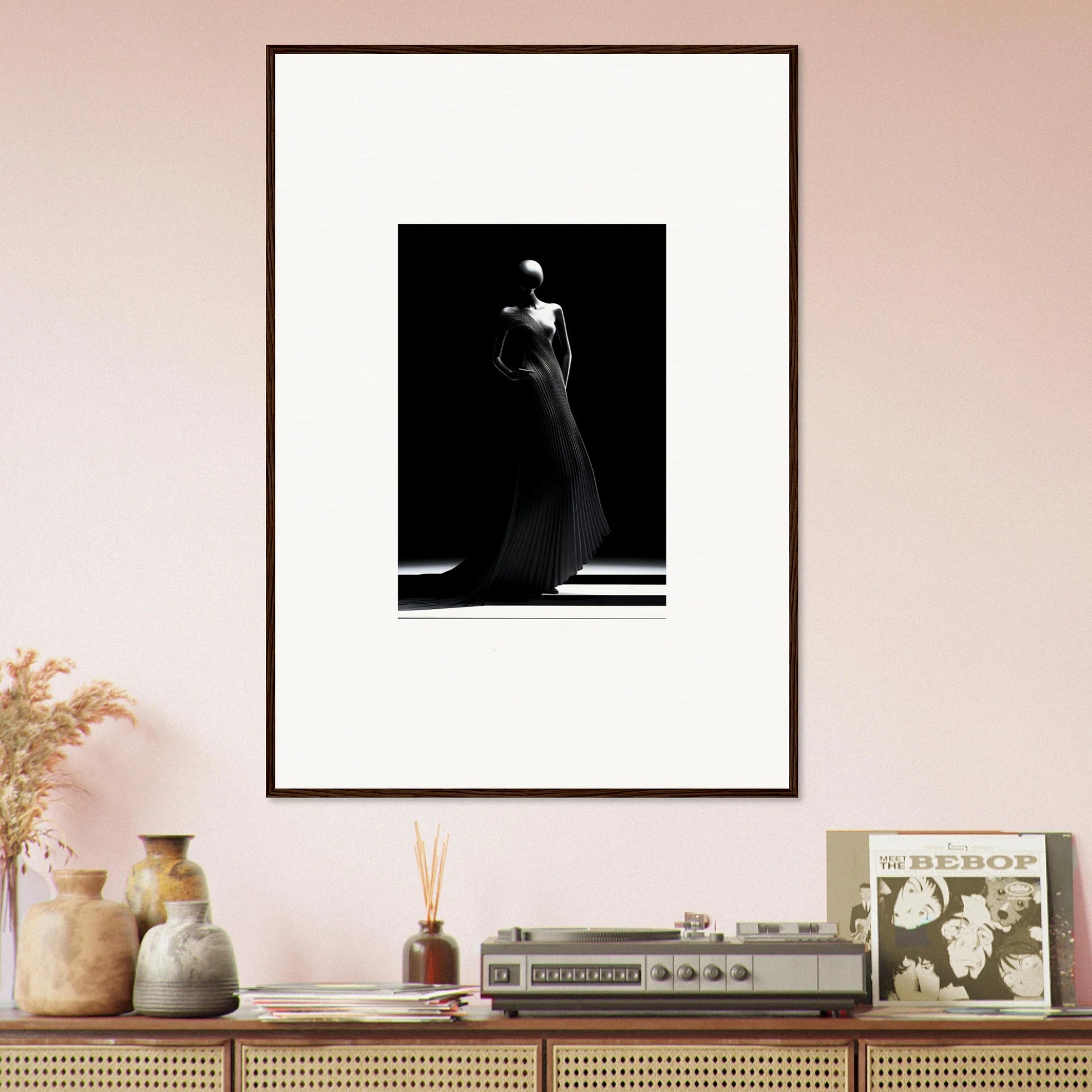 Framed black and white photo of figure in elegant dress from Echoes Velvet Mirage collection