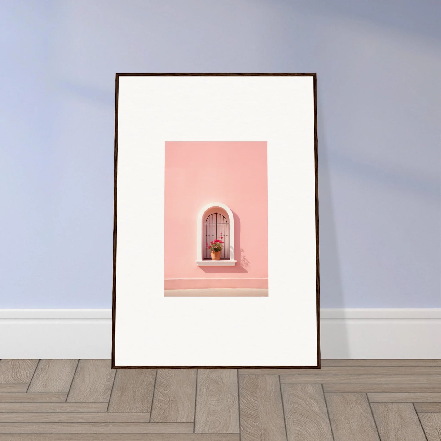 Framed art print of a pink arched window with a plant from Sunset Silhouette Romance