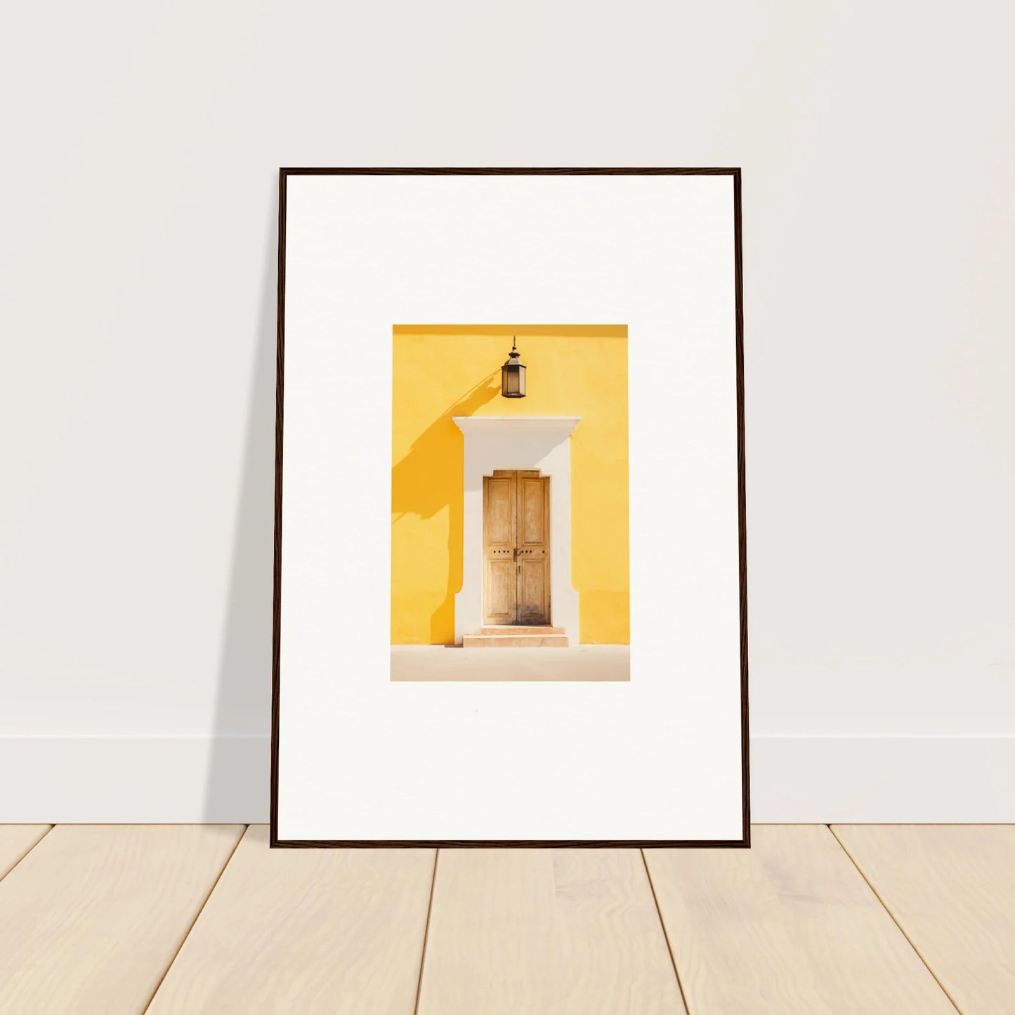 Framed wall art of a wooden door on a yellow wall, perfect for your Golden Hue Portal