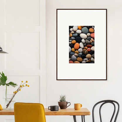 Framed photo of colorful river rocks on white wall of Elemental Whisperbound Ascendancies