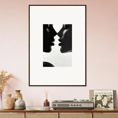 Black and white silhouette art of two profiles about to kiss in a premium framed wall