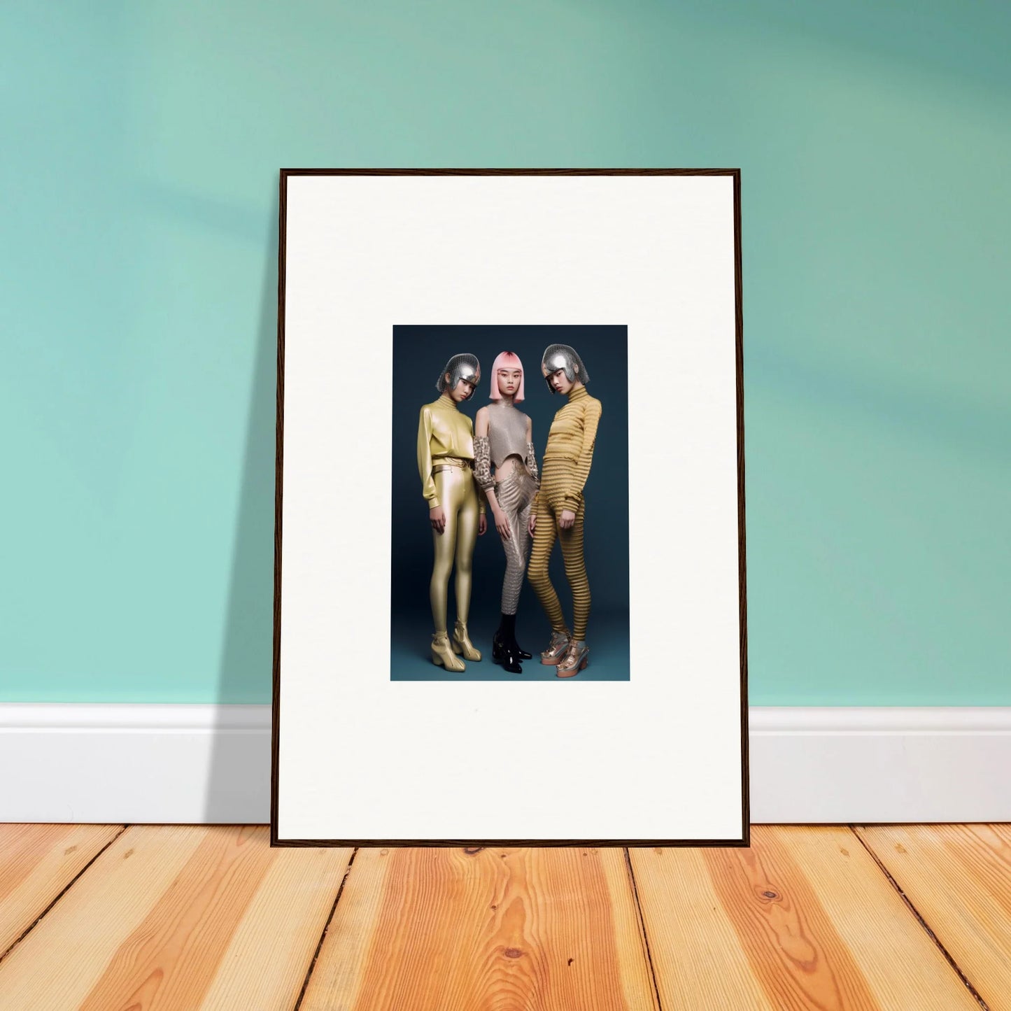 Framed wall art of three figures in metallic bodysuits from Galactic Fashion Paradigm