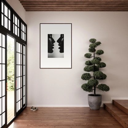 Framed black and white silhouette of two faces, Echo’s Embrace special edition art