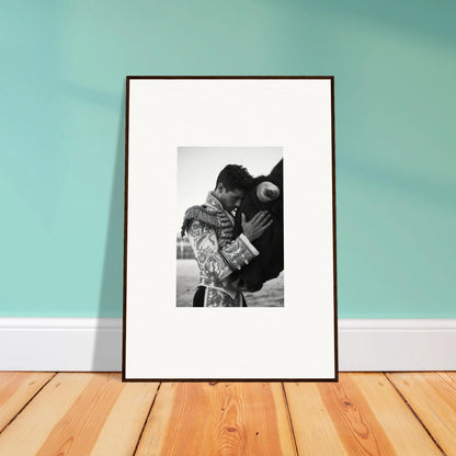 Framed black and white photo of a tender moment with horse in Triumphant Shadows Embrace