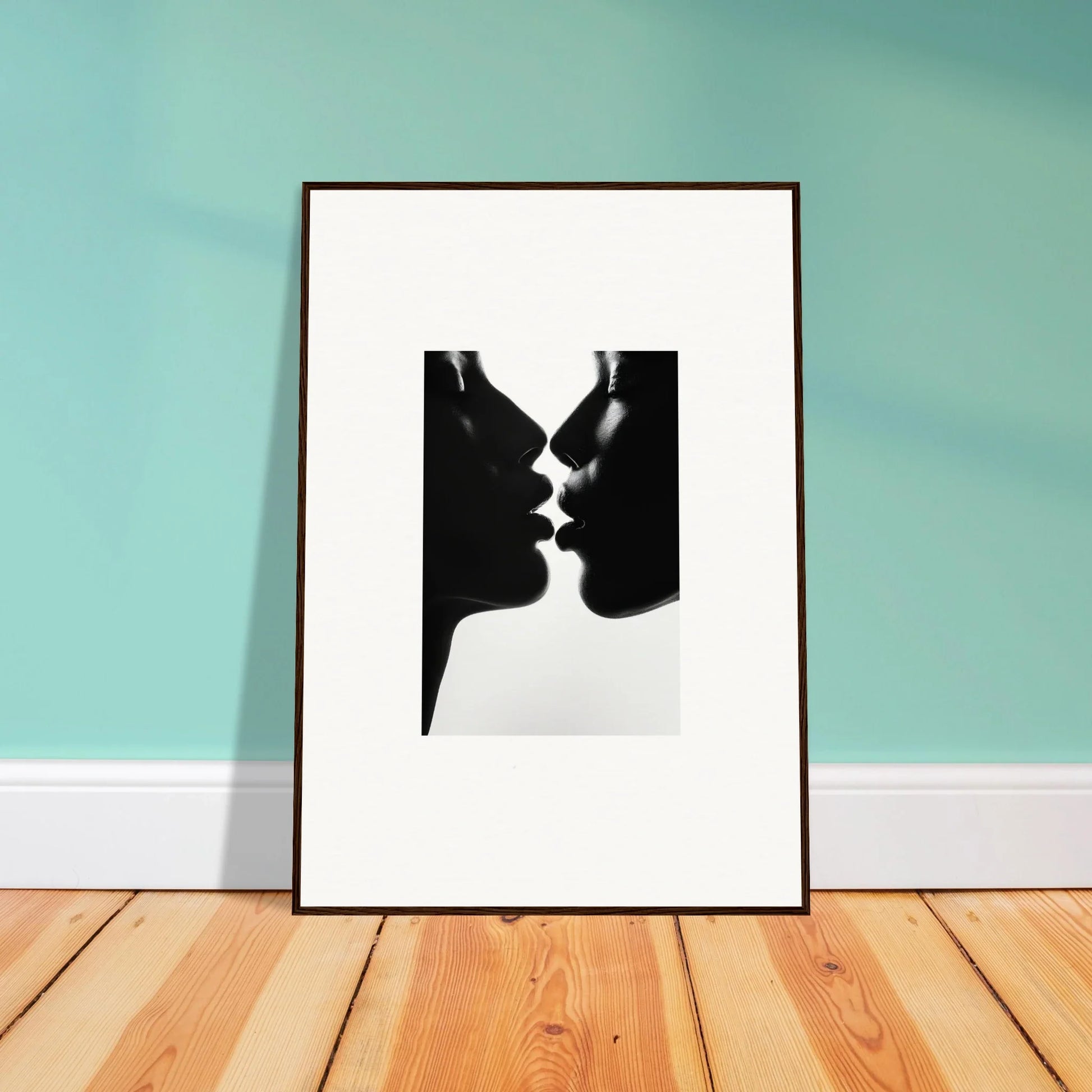 Black and white silhouette of two profiles about to kiss in Luminous Midnight Kiss art