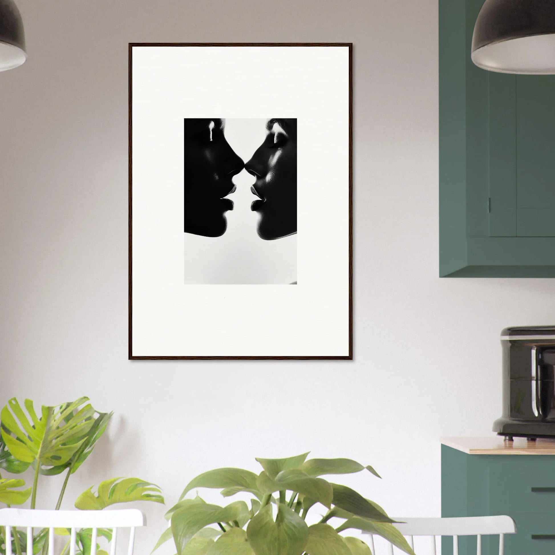 Black and white framed wall art of two profiles for Eclipsing Soulcare Kisses