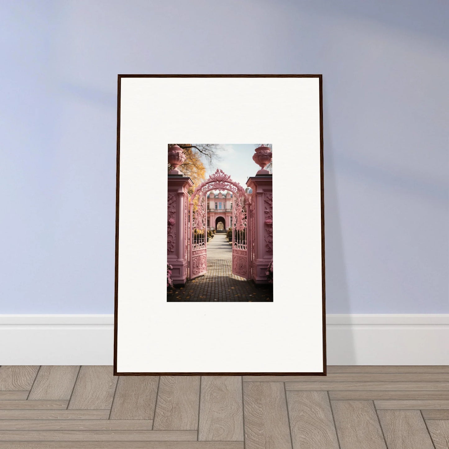 Framed photograph of the Sugarcotton Visions Gateway with ornate pink stone and ironwork