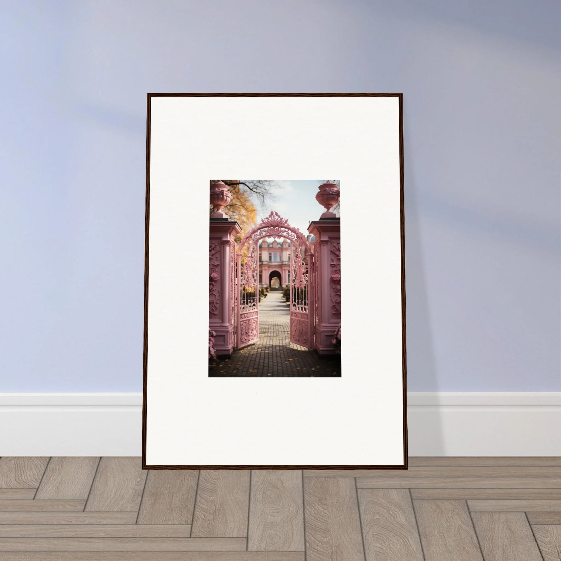 Framed photograph of the Sugarcotton Visions Gateway with ornate pink stone and ironwork