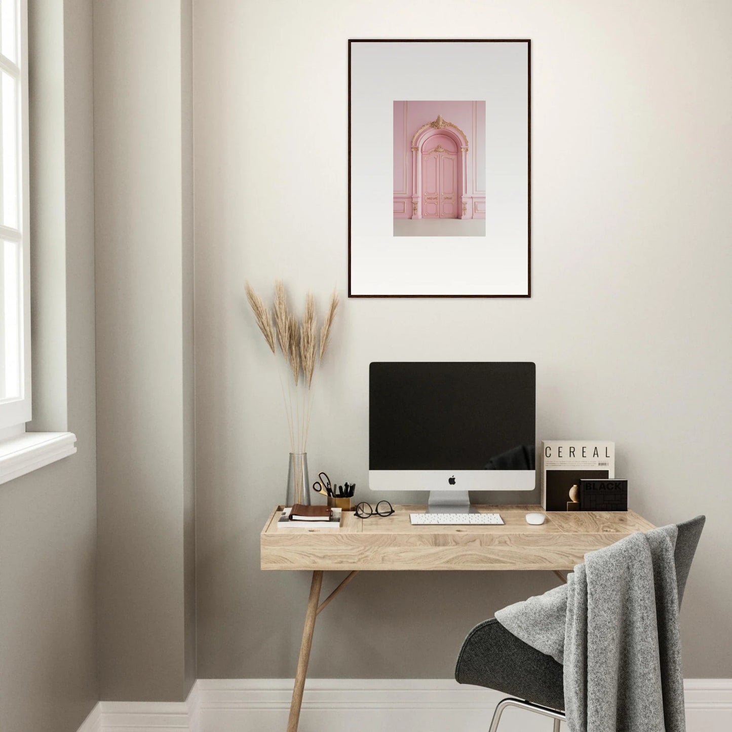 Minimalist wooden desk with iMac and decor featuring Paris Dreams Frame wall art