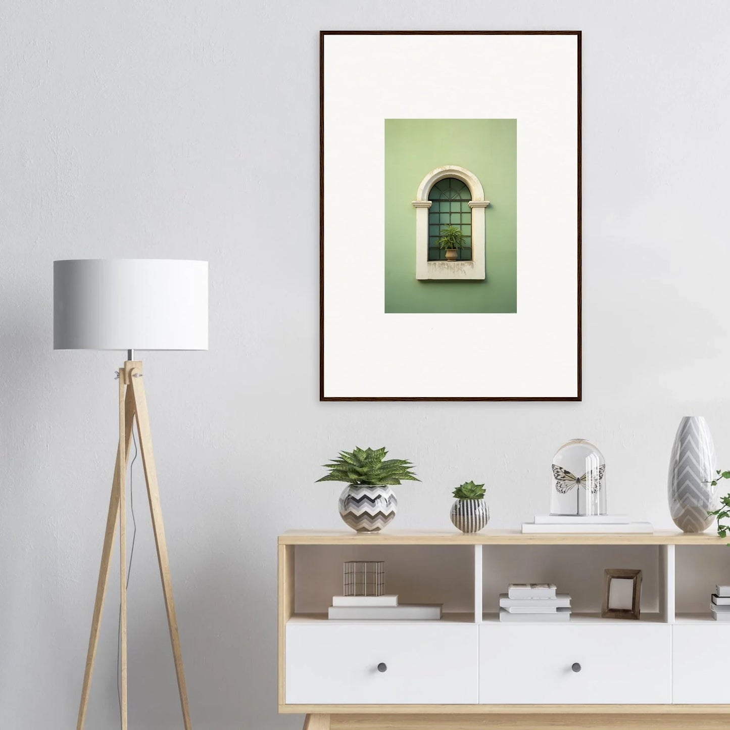 Framed wall art of an arched window on a green wall from Eggshell PandæmonIA Bliss