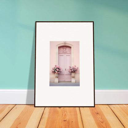 Framed wall art of a pale pink door in Rosy Cosmos Gateway with floral arrangements