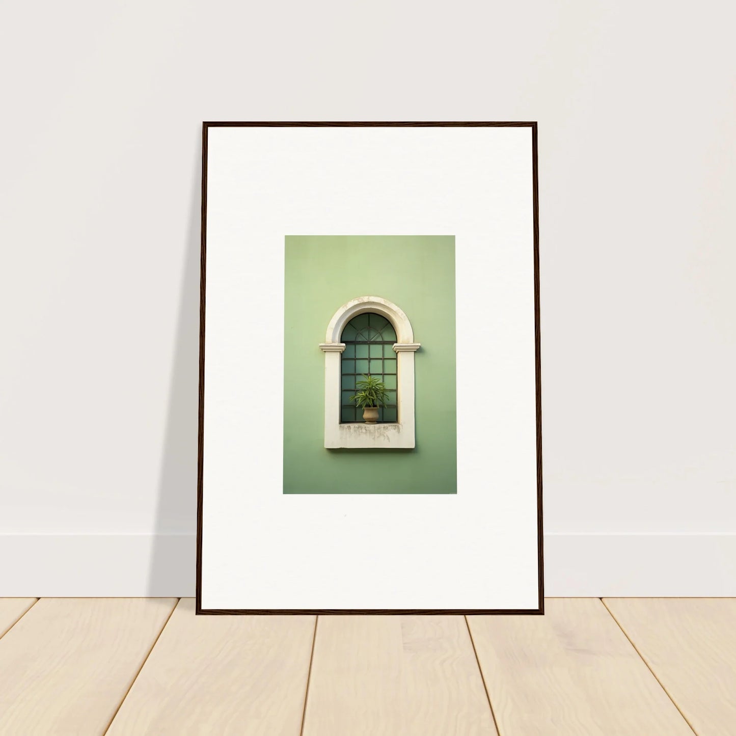 Framed wall art of arched window with plant in Eggshell PandæmonIA Bliss design