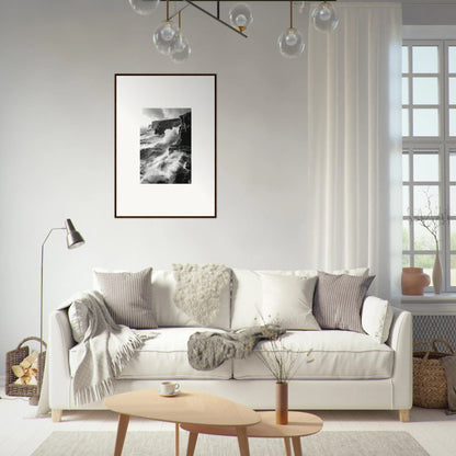 White sofa adorned with gray and cream pillows in Tempestuous Rock Ballet decor