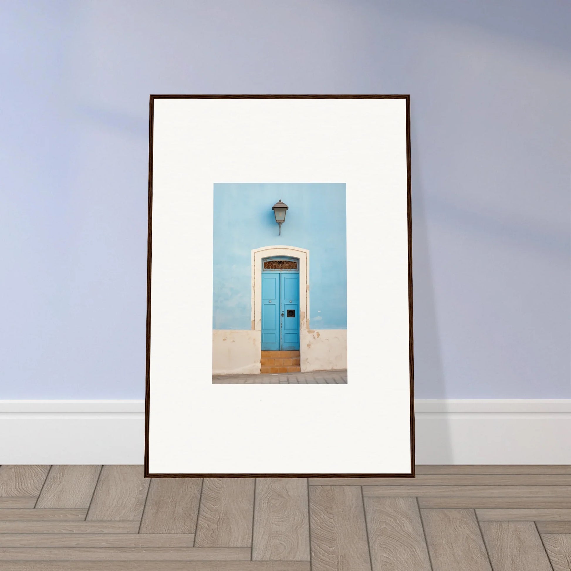 Framed wall art featuring surreal azure Vesaurrezz with a cheerful blue door and lamp