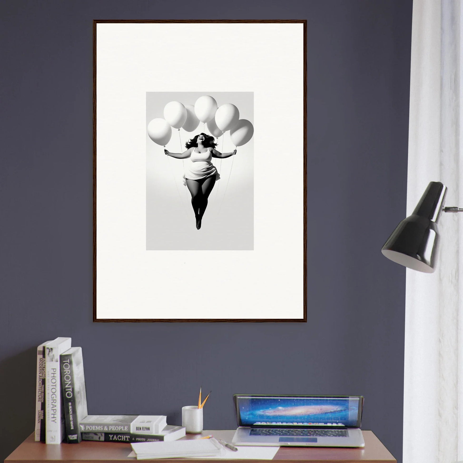 Black and white framed wall art of a figure with balloons from Rosy Liberties Soar