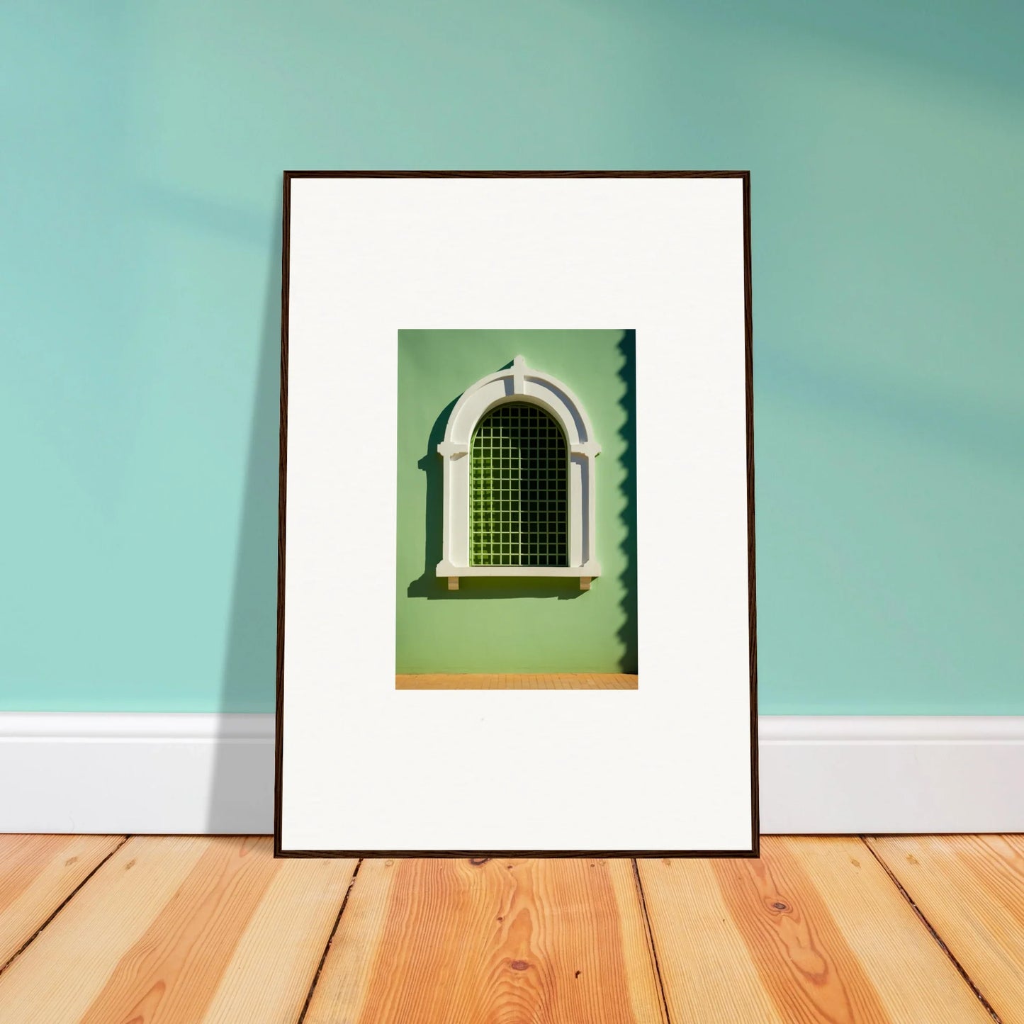 Framed photograph of a decorative Equilibrium Window on a green wall in Visible Equilibrium Window