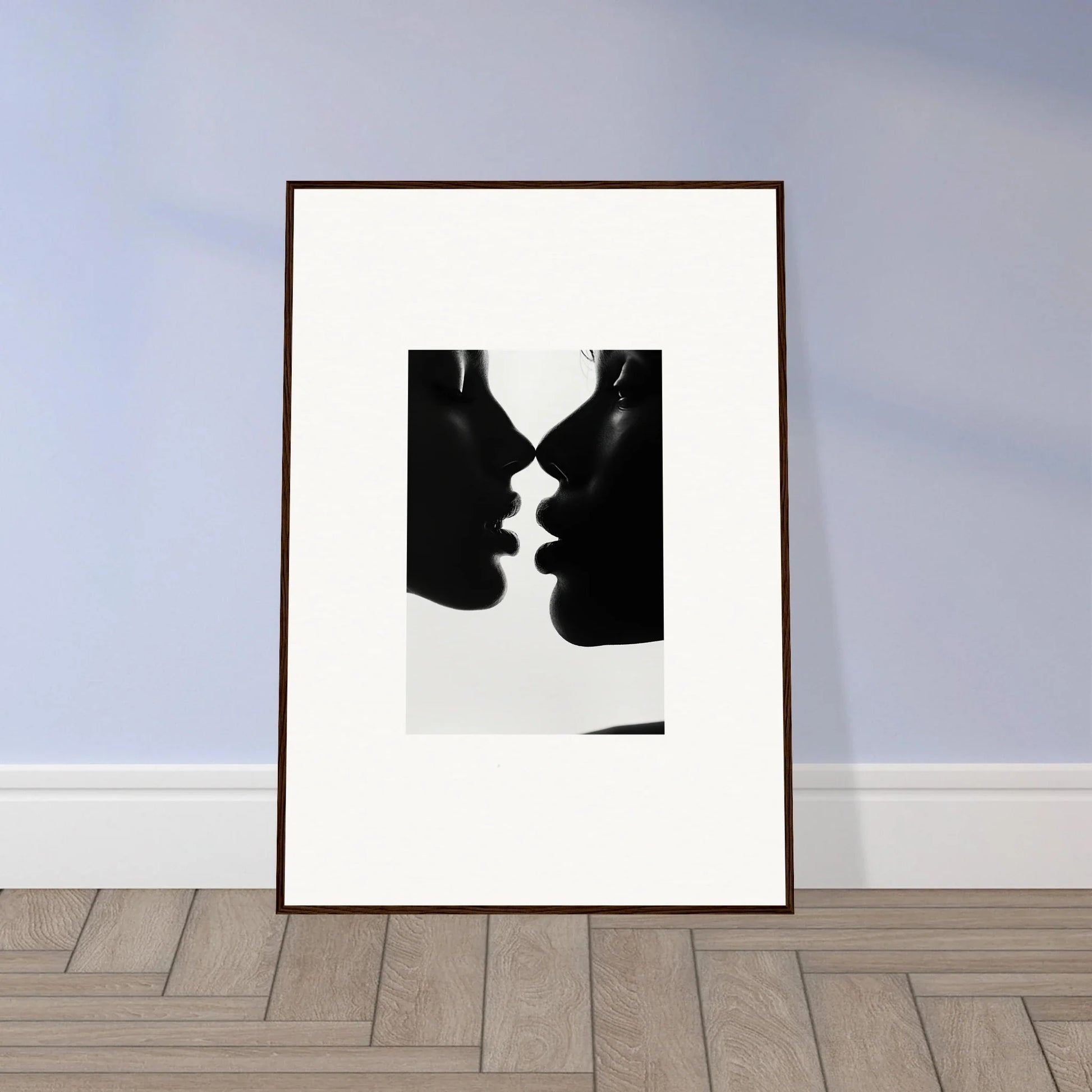 Black and white silhouette of two profiles in a Nights Echoes framed print