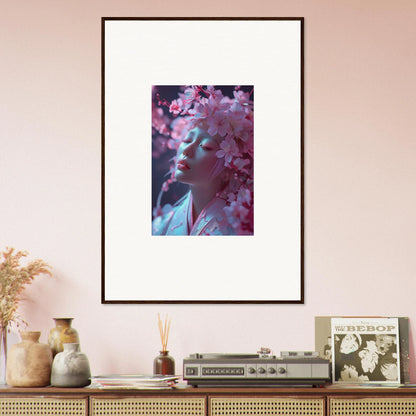 Framed wall art of a person in pink cherry blossoms, perfect for room decoration