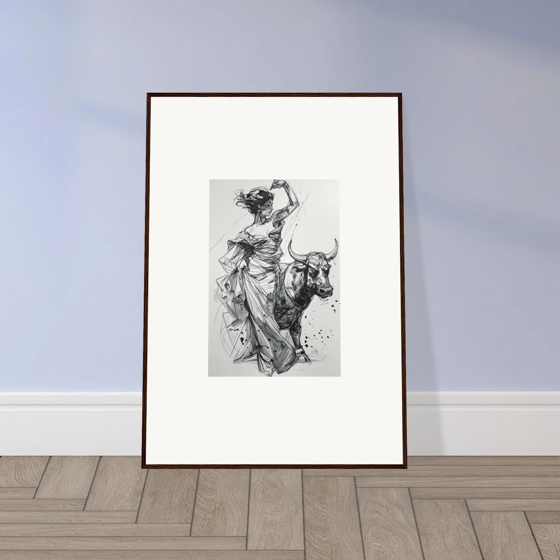 Framed black and white sketch of a figure riding a bull in Tauripe Mystique Visions