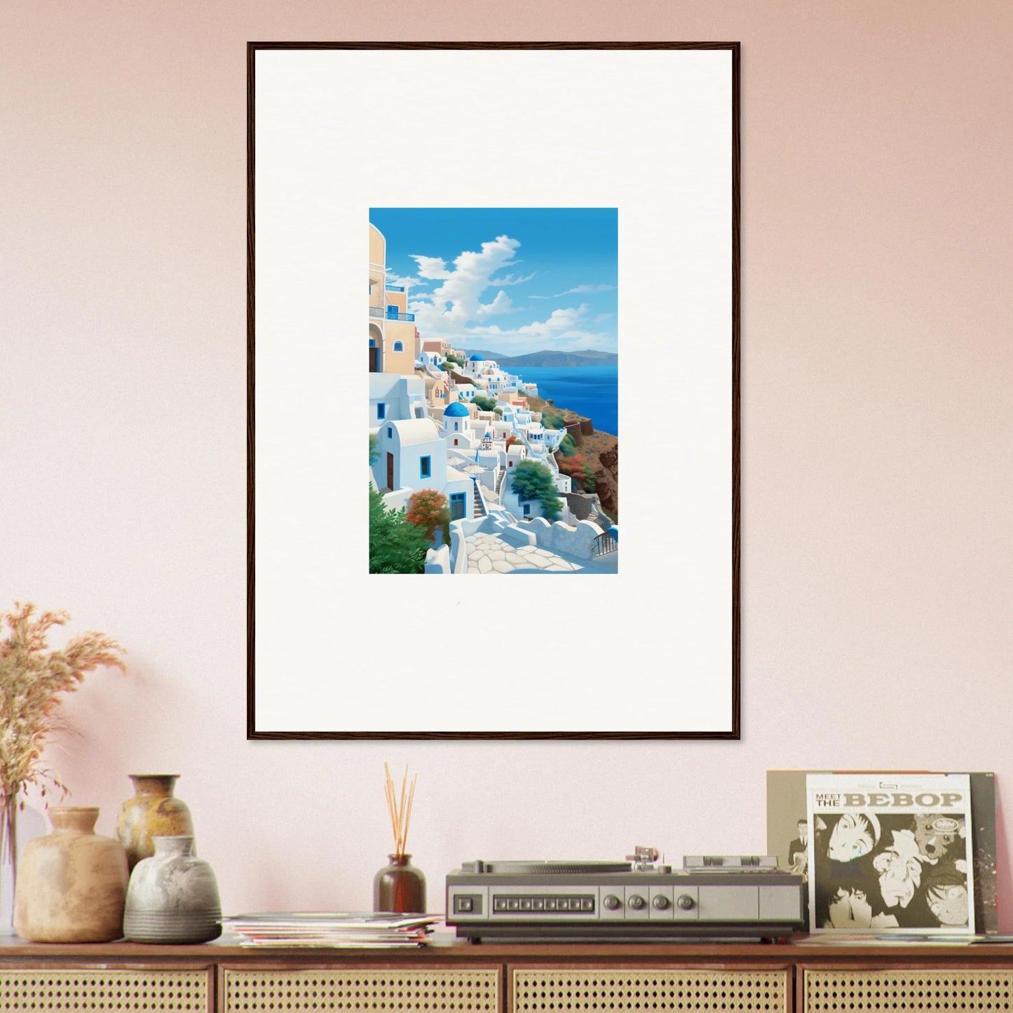 Framed Santorini art print from Sunday Stahl, showcasing blue and white buildings by the sea