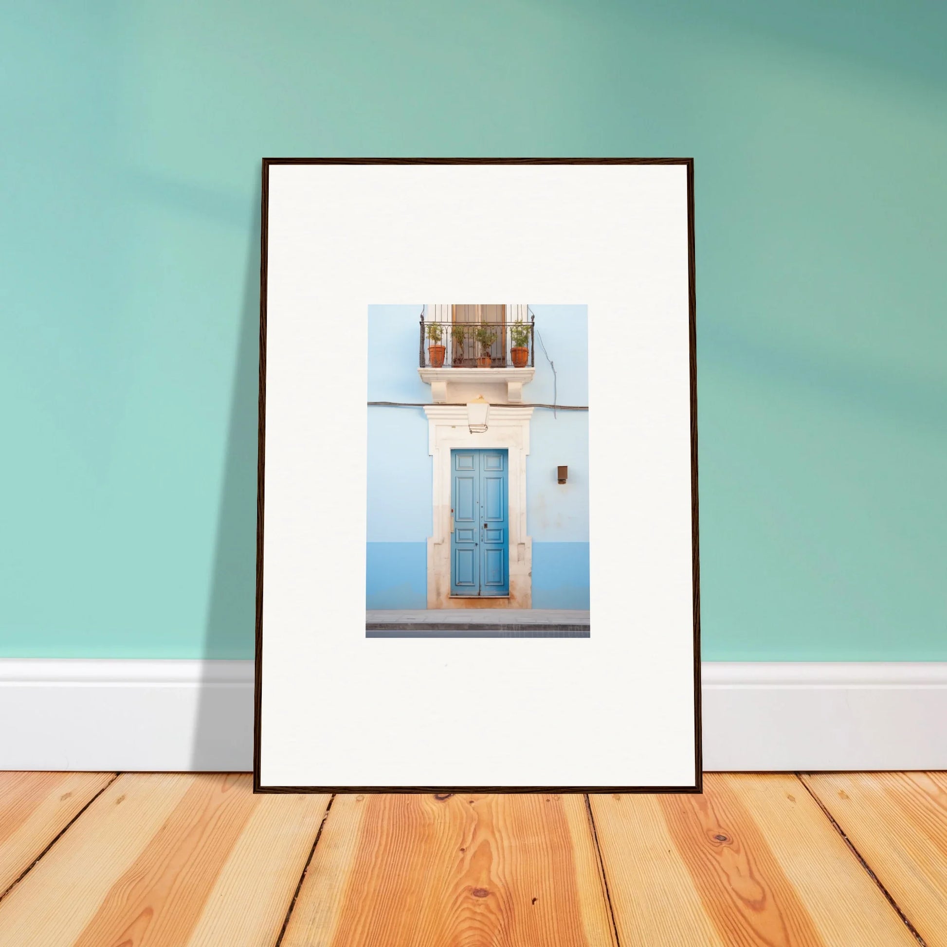 Framed wall art of Ethereal Azul Entrance features a blue door and window on white wall