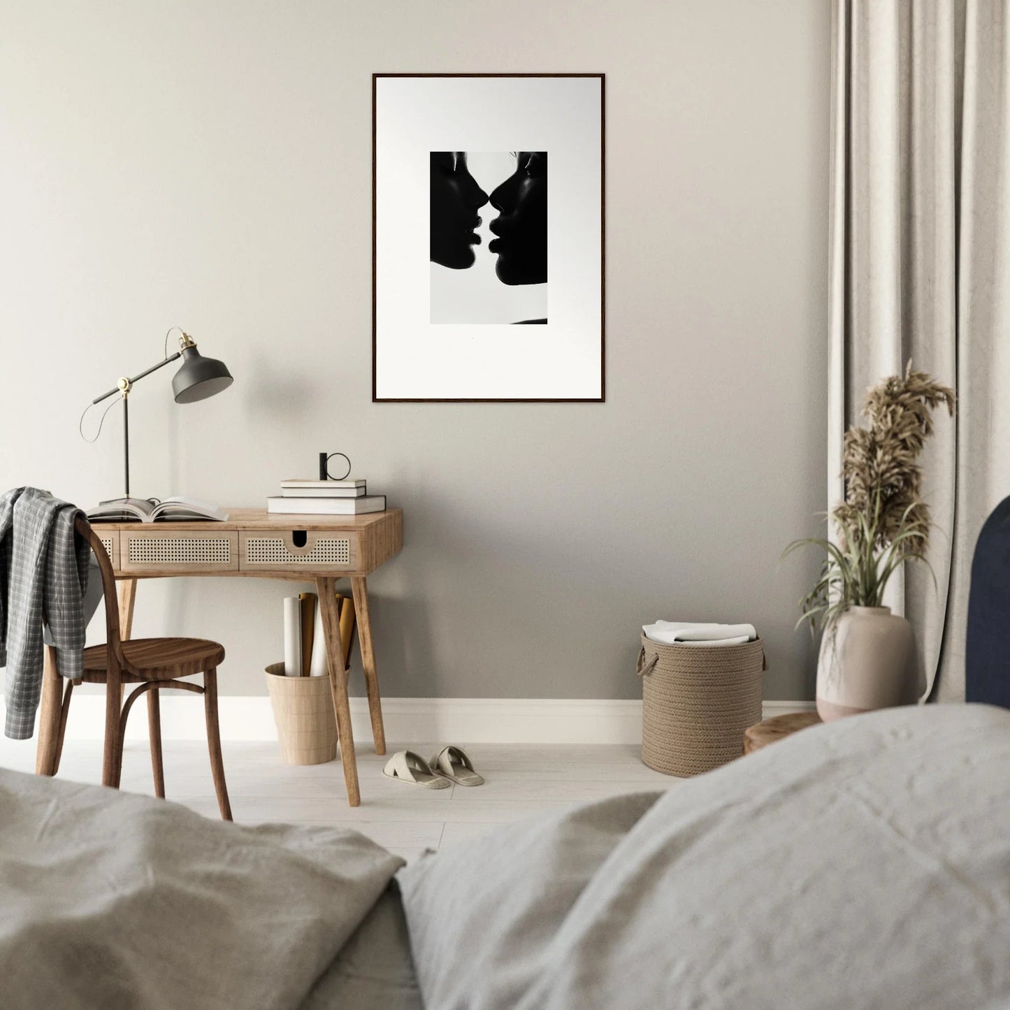 Minimalist black and white silhouette of two faces in ’Nights Echoes’ framed art