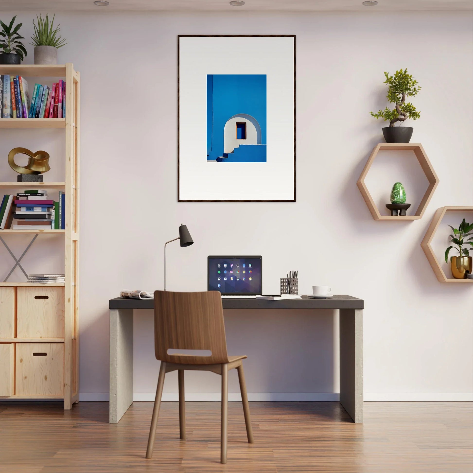 Modern home office with dark desk and framed wall art from Doorway of Dreams