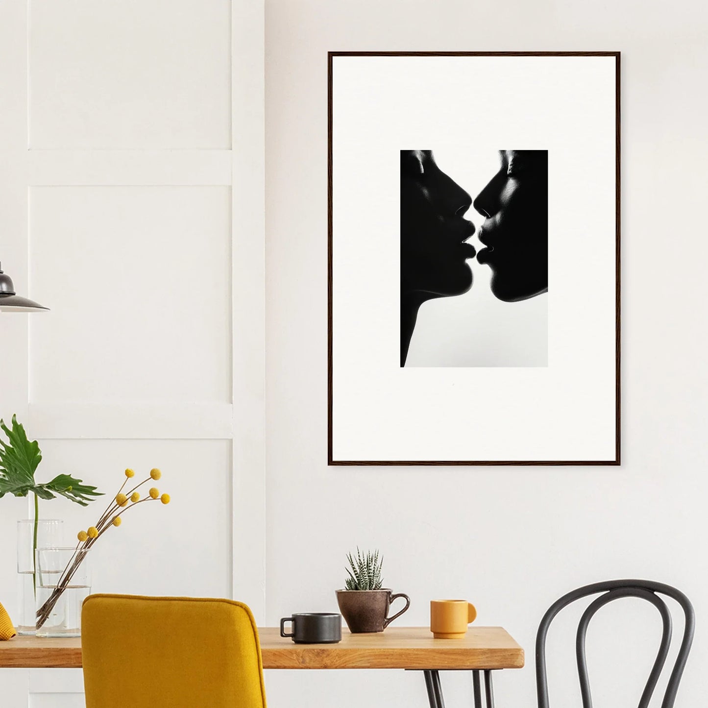 Black and white silhouette of two profiles sharing a Luminous Midnight Kiss framed art