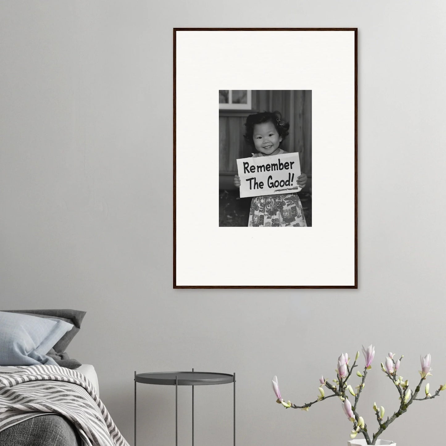 Framed wall art of a person with a Remember The Good sign from Essence Savor Whispers