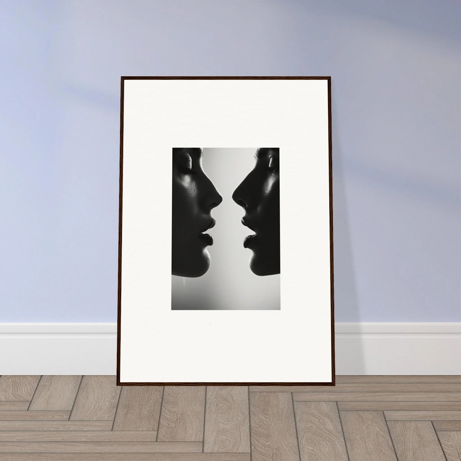 Framed black and white photo of two silhouettes from Echo’s Embrace special edition art™