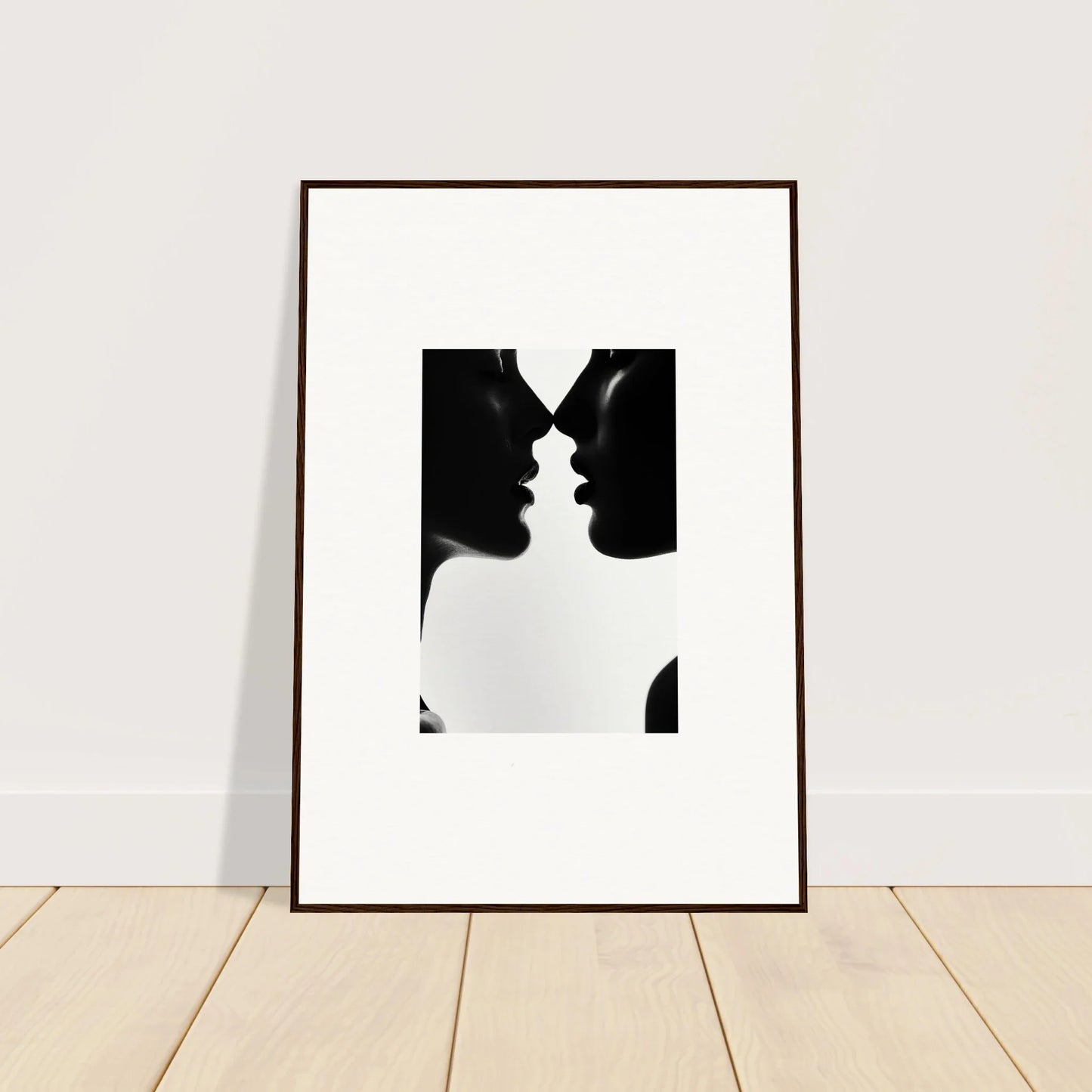 Framed black and white silhouette of two profiles in Shadowed Sédual Symphony art™