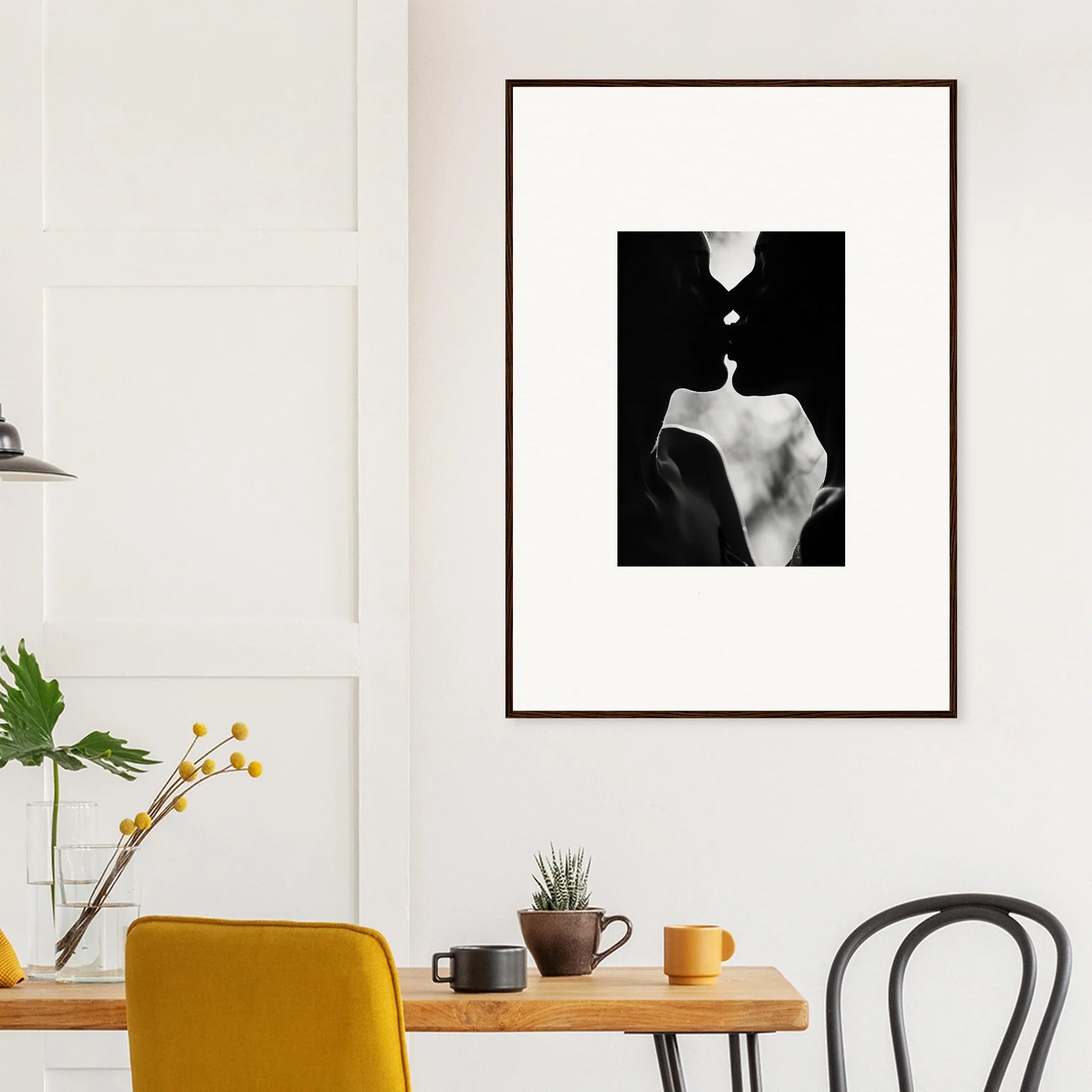 Black and white Shadowy Dawn Nuance framed wall art of a couple about to kiss