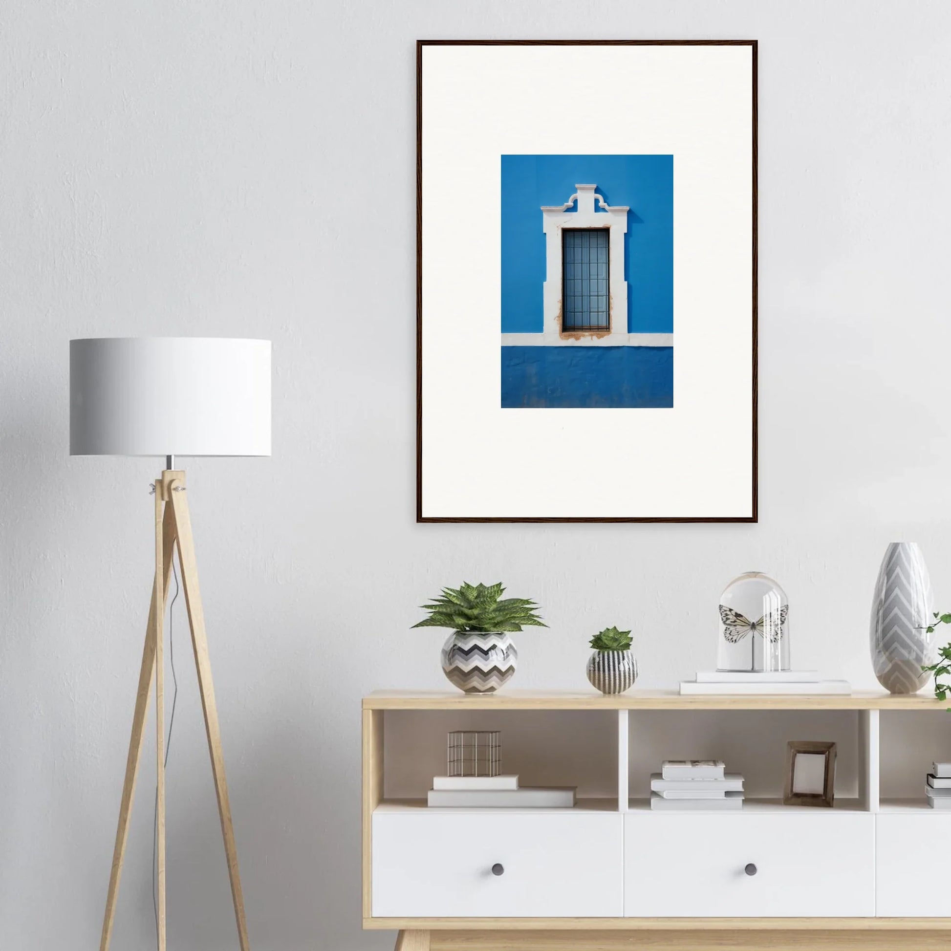 Framed wall art of a white window on a bright blue wall from Liquid Azure Quest Series