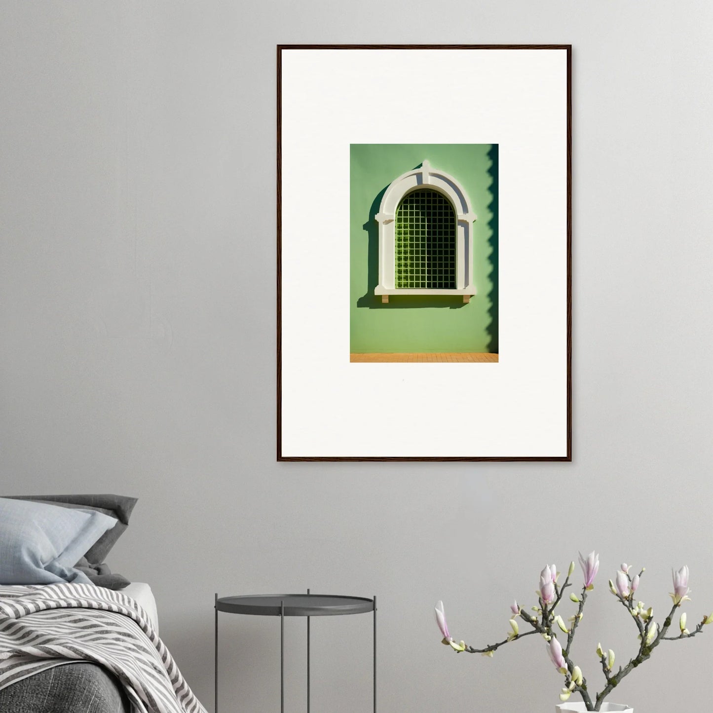 Arched window with green metal bars in mint wall, showcasing Visible Equilibrium Window design