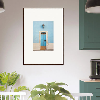 Framed wall art featuring a surreal azure Vesaurrezz with a blue door and lantern